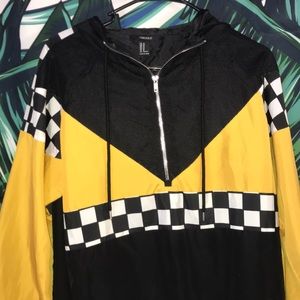Windbreaker with checkered detail
